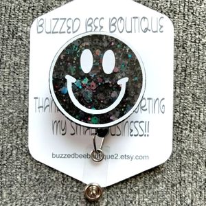 Smiley face retractable name badge reel ID holder
